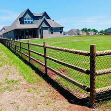 Deer-Creek-OK-Ranch-Rail-Fence-with-Black-Vinyl-Coated-Chain-Link-Gates 0
