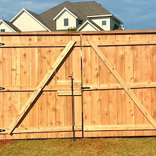 Edmond-OK-Cap-Trim-Western-Red-Cedar-Fence-with-Split-Rail-Agricultural-Wire-and-Custom-Iron-Gate 2